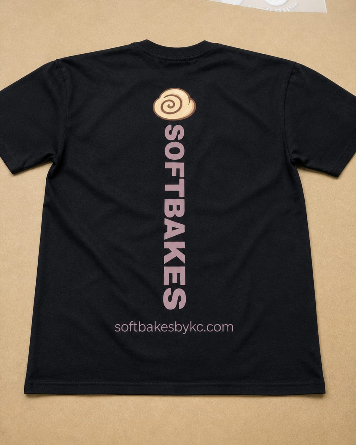 Soft Bakes back print on a black tee